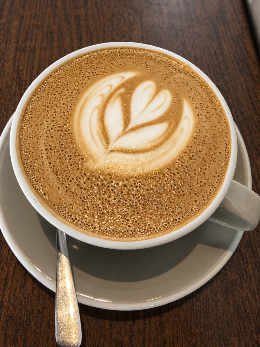 Coffee with latte art at Loop Cafe